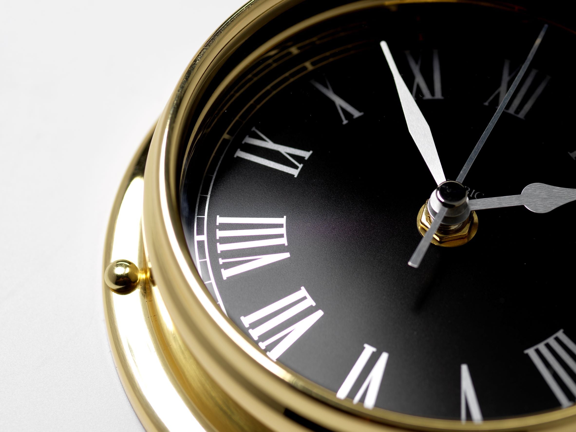 Handmade Prestige Roman Numeral Clock in Solid Brass With a Jet Black Dial. - TABIC CLOCKS