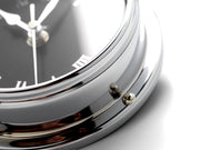 Handmade Prestige Roman Clock in Chrome with Jet Black Dial created with a mirrored backdrop