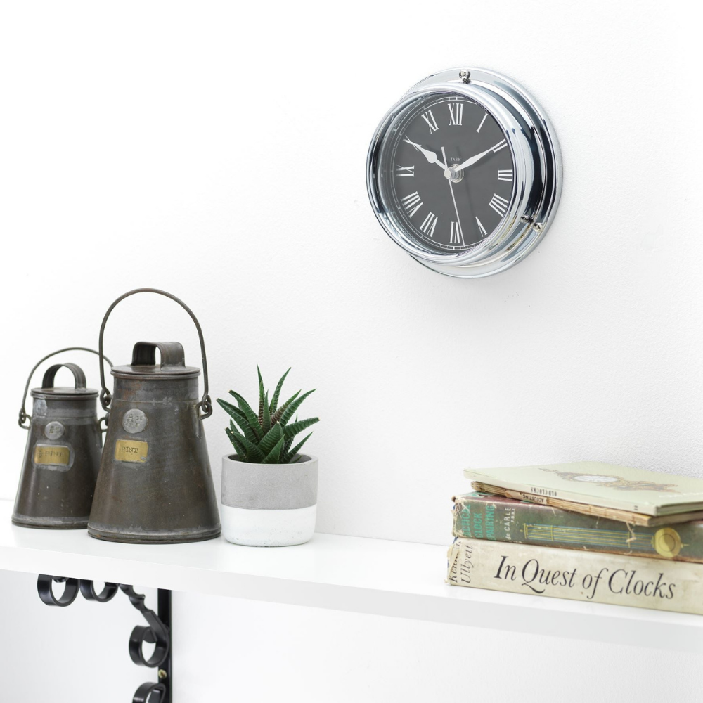 Handmade Prestige Roman Clock in Chrome with Jet Black Dial created with a mirrored backdrop