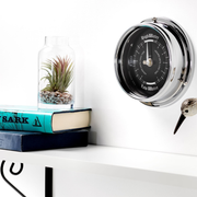 Handmade Prestige Tide Clock in Chrome With A Jet Black Dial created with a mirrored backdrop