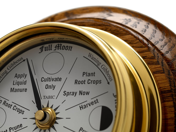 Solid Brass Moon Gardening Clock on an English Dark Oak Wall Mount