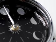 Handmade Prestige Moon Phase Clock in Chrome with Jet Black Dial created with a mirrored backdrop - TABIC CLOCKS