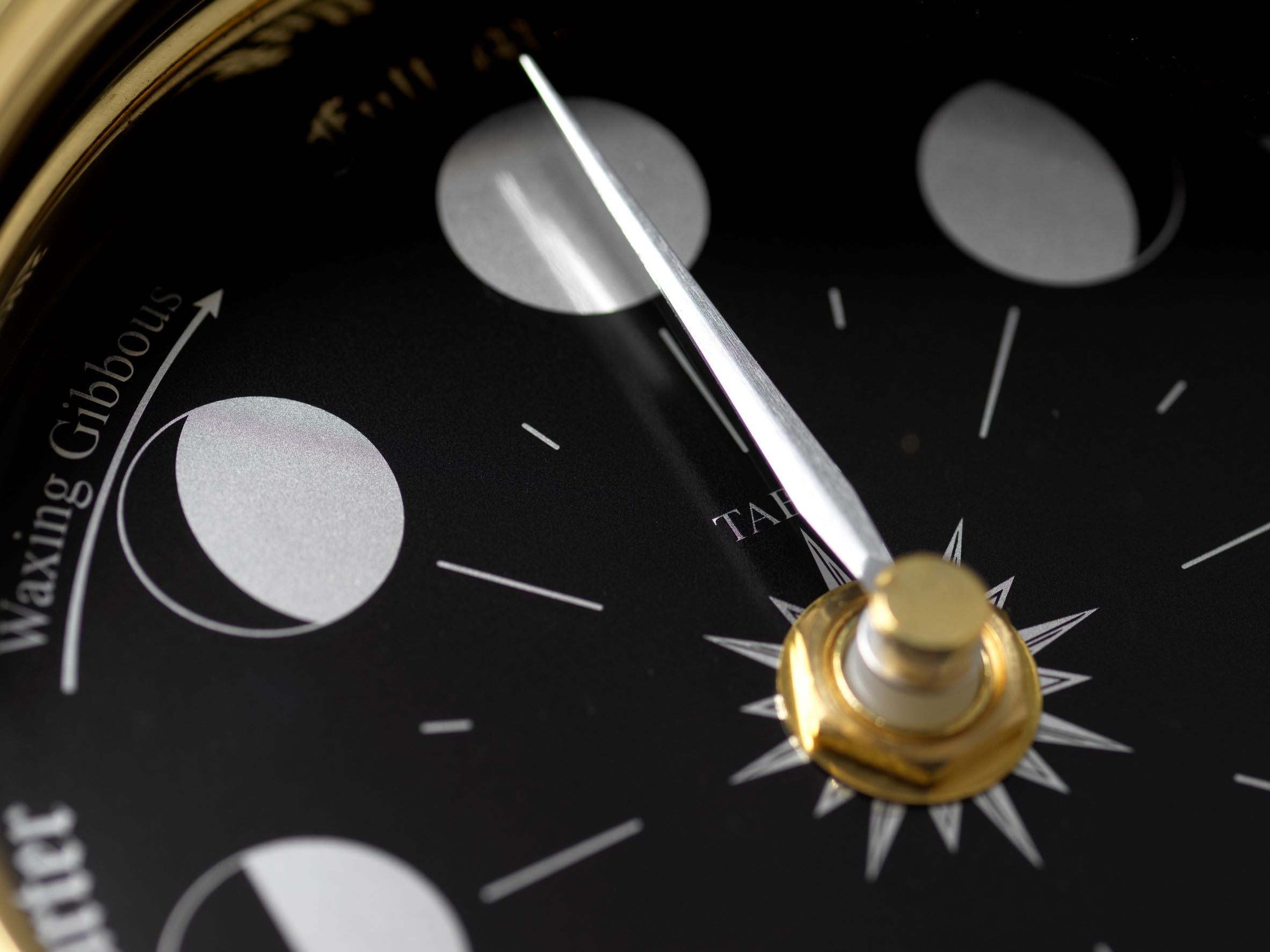 Handmade Prestige Moon Phase Clock in Solid Brass With A Jet Black Dial created with a mirrored backdrop - TABIC CLOCKS